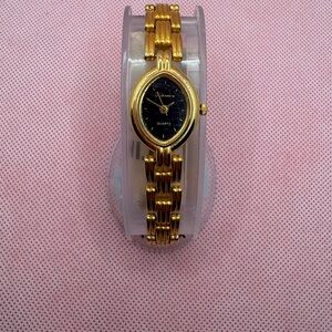 Armitron style Gold and Black Women's Watch